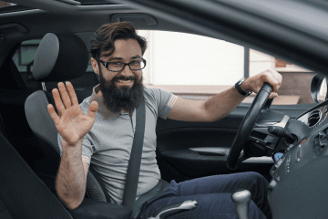 man-glasses-car-mobile